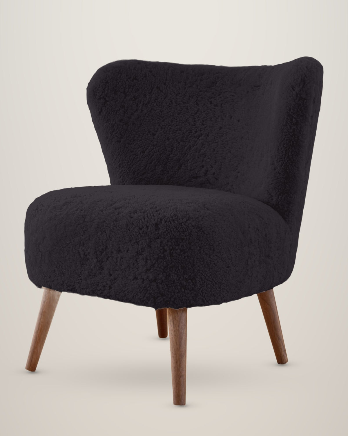 Sessel mit Kurzhaar-Lammfell in Schwarz