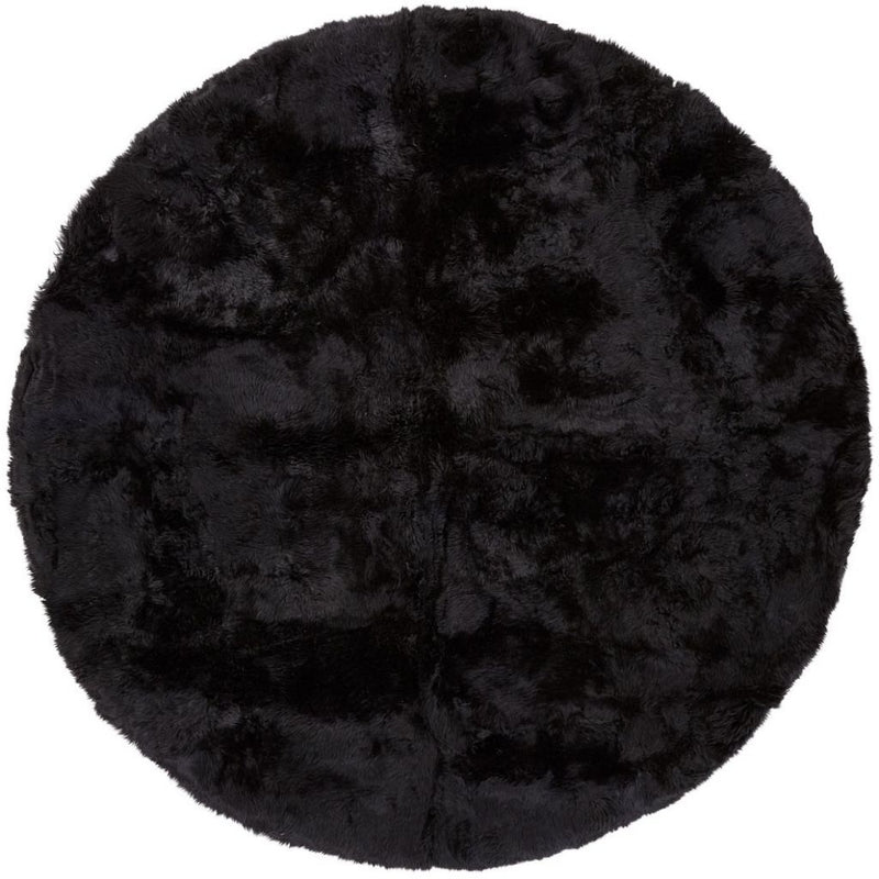 Schwarzer runder Fellteppich aus echtem Lammfell