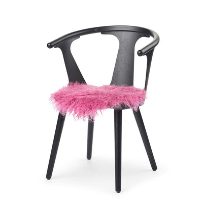 Stuhlauflage aus pink Lammfell