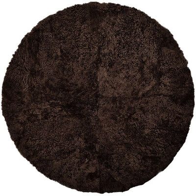 Runder Teppich aus dunkelbraunem Lammfell